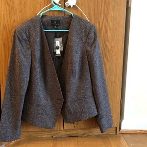 Women’s blazer and skirt size 14. Brand new.